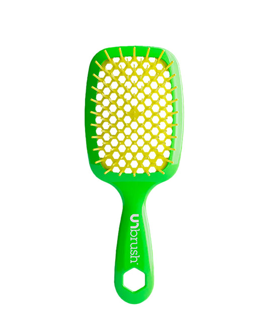 Vibrant Green Unbrush detangling brush with vibrant yellow hexagon bristle pattern, designed for gentle use on wet or dry hair.