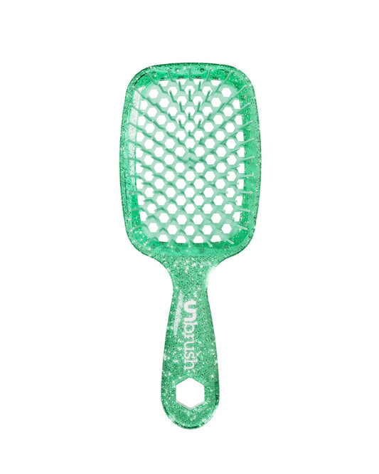 Glitter Teal Unbrush detangling brush with teal hexagon bristle pattern, designed for gentle use on wet or dry hair.